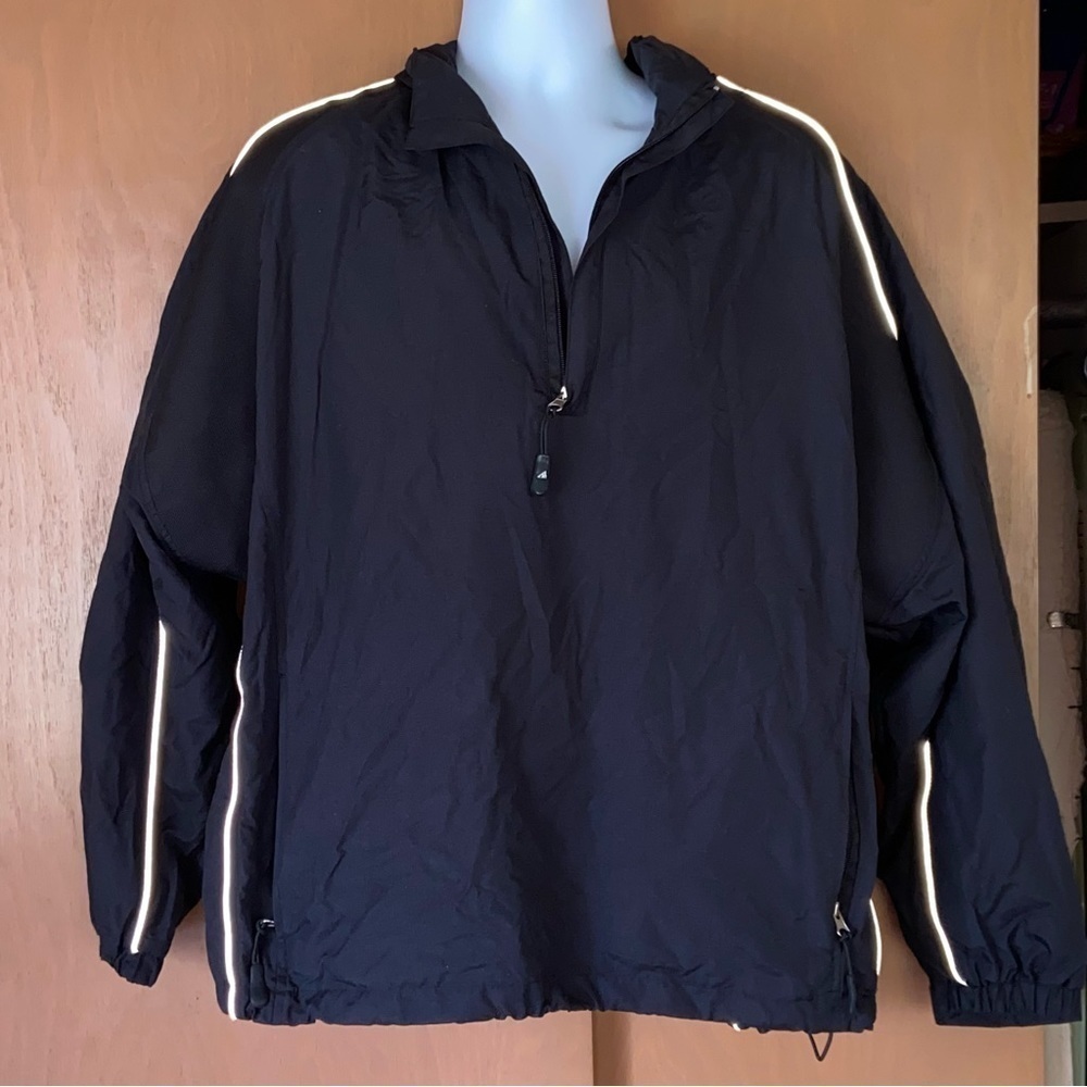 AMERICAN Team Sports Pro Celebrity jacket with hidden hood and generous pockets.